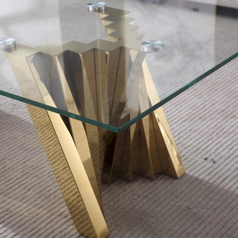 Tavolino da caffè con piano in vetro temperato e base in acciaio inossidabile con finitura a specchio dorata