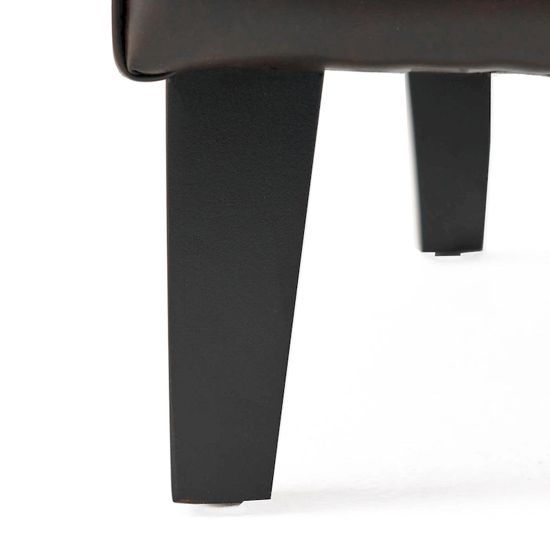 27 Poltrona con schienale alto