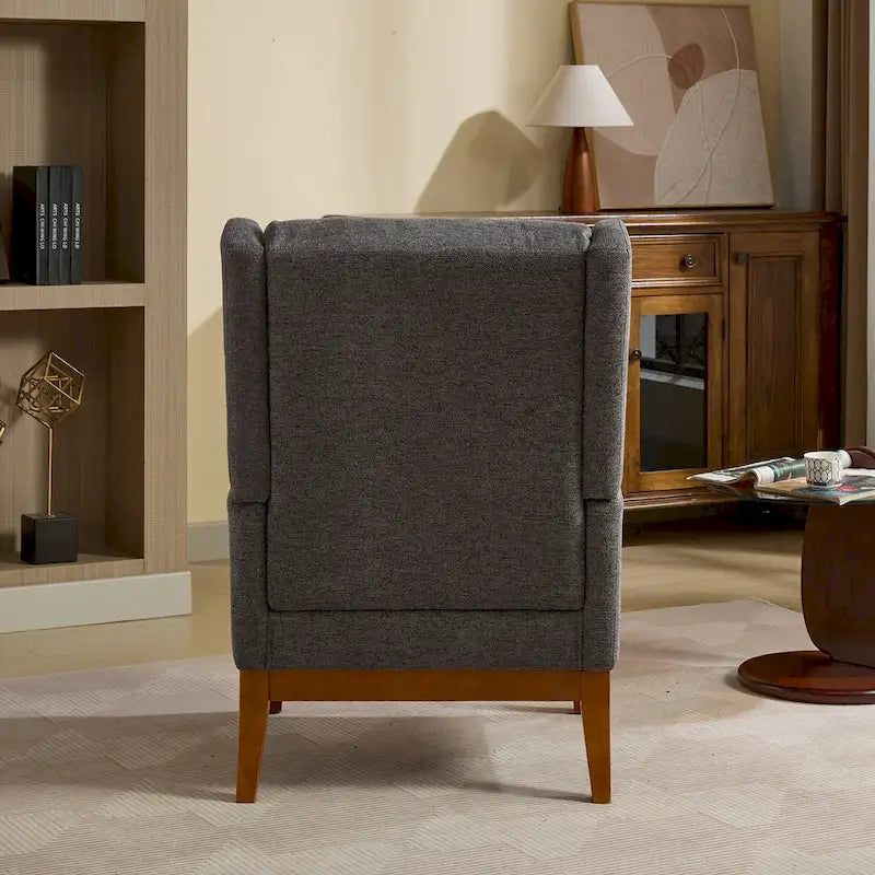 26.18 Poltrona imbottita con schienale alto