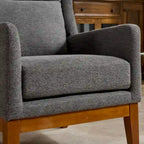 26.18 Poltrona imbottita con schienale alto