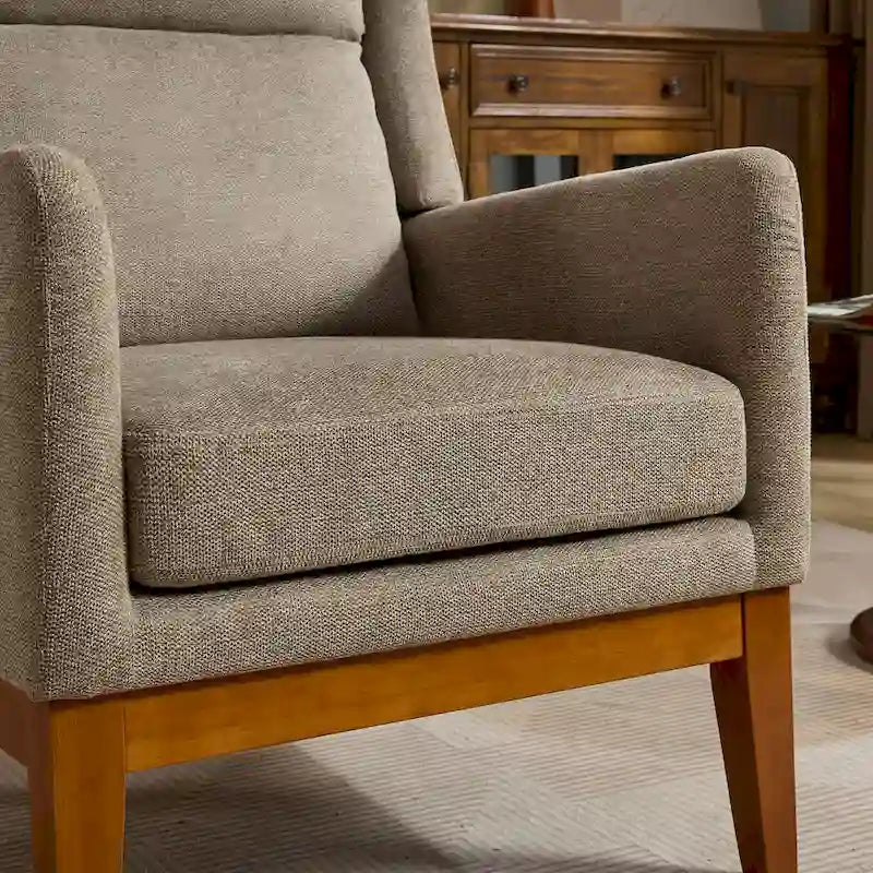 26.18 Poltrona imbottita con schienale alto