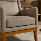 26.18 Poltrona imbottita con schienale alto