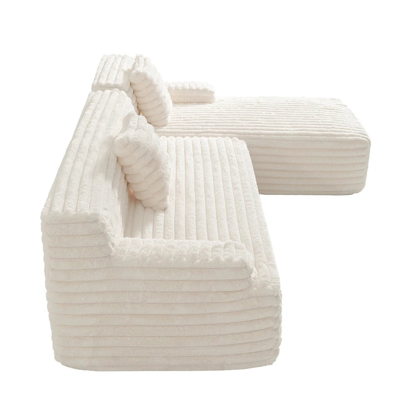 Divano componibile a L a 3 posti in pelliccia sintetica 110 Cloud con due cuscini inclusi