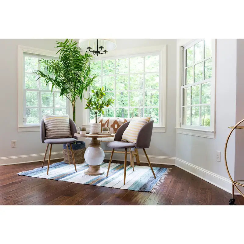 Tavolo rotondo con piedistallo in legno di mango e metallo,