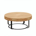 Tavolino da caffè rotondo moderno con motivo intagliato in legno e gambe in metallo