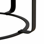 Tavolino da caffè rotondo moderno con motivo intagliato in legno e gambe in metallo