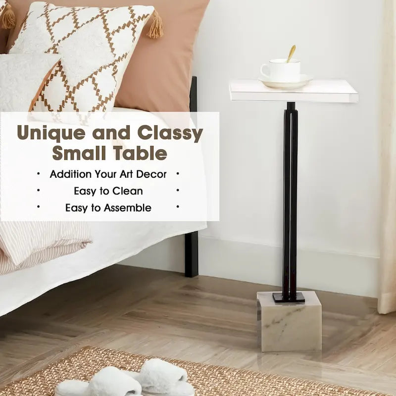 Tavolino da bar contemporaneo con piedistallo in marmo nero